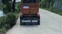 tiga roda pengangkut sampah